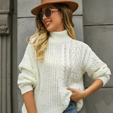 White cable knit turtleneck sweater for women in size XL, showcasing cozy winter fashion with knit details and a high neck, perfect for staying warm and stylish.