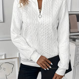 White cable knit zip-up sweater for women, featuring a stylish design suitable for autumn wear. The sweater displays intricate knit patterns, with a front zipper and a comfortable fit around the shoulders and arms.