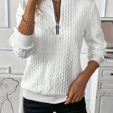 White cable knit zip-up sweater for women in size XXL, featuring a cozy autumn design. The sweater is paired with jeans, showcasing a chic and fashionable look.