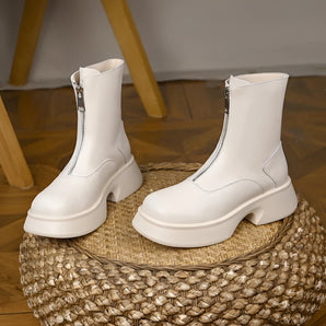 White chunky platform ankle boots for women with zipper, featuring a fashion-forward design, beige material, and stylish pattern.
