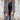 Women's stylish gray and white fringed cardigan featuring long sleeves and a waist-length design.