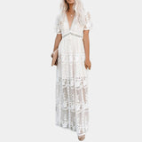 White lace maxi dress with a bohemian V-neckline and flowing silhouette, suitable for a beach wedding, in size XL.