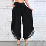 White lace palazzo pants in a bohemian summer and bridal style, designed for a 3XL size with a flowy and elegant appearance.