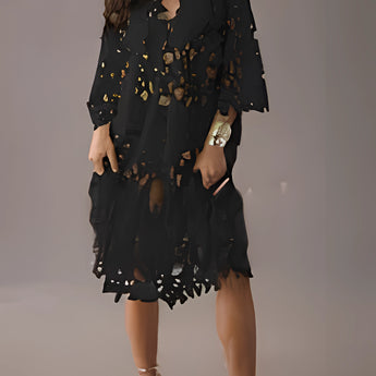 White laser-cut cotton kaftan dress in a boho chic style, featuring long sleeves, a relaxed fit, and intricate detailing.