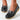Black leather tassel loafers for women, showcasing a casual slip-on design with a comfortable fit, suitable for size 44.