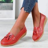 White leather tassel loafers for women in size 44, featuring a casual slip-on design. The image highlights the shoe's red color variant with a comfortable fit, suitable for casual wear.