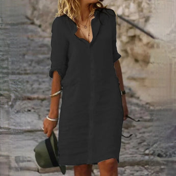 White linen button-down dress styled as a casual summer beach cover-up, featuring short sleeves and a relaxed fit, designed for plus size in 3XL.