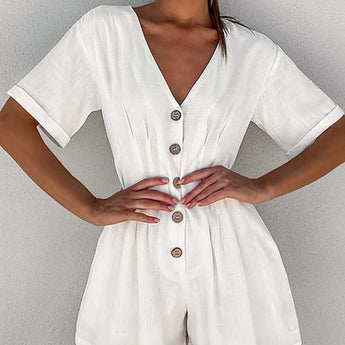 White linen mini dress worn by a model, showcasing its lightweight and breathable fabric, ideal for eco-friendly summer fashion, size L.