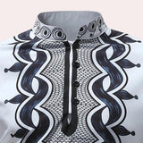 White long-sleeve men's shirt featuring embroidered cuffs and a patterned collar, styled for formal wear with symmetrical design elements.