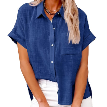 
A blue, loose-fit women's summer linen shirt in size 5XL with casual short sleeves displayed with focus on the shoulder and arm areas.