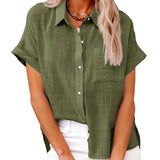 
A green, loose-fit women's summer linen shirt in 5XL size, featuring short sleeves and designed for a casual look.
