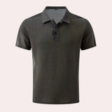 Gray 4XL men's breathable cotton short sleeve summer polo featuring a classic collar, button closure, and a subtle pattern.