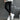 White chunky platform sneakers with trendy lace-up design, showcased on a model wearing casual streetwear.