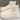 White quilted insulated lightweight winter snow boots with a beige shade, designed for comfort and outdoor walking, featuring a synthetic rubber sole.