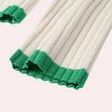 Unisex white ribbed knit top featuring a distinctive green collar, ideal for spring wear.