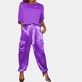Purple satin jumpsuit and cargo pants set in 2XL, featuring a fashionable design with a focus on the neck, sleeve, and waist areas, suitable for women's loungewear or workwear.