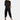 
A woman wearing a black satin jumpsuit with cargo pants, featuring long sleeves and a tailored waist, suitable for loungewear or casual outings.