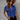 Blue V-neck short sleeve blouse in a 5XL size, designed for women's summer office wear, displayed on a mannequin with a focus on the shoulder and neck area. The blouse has an elegant and stylish appearance, suitable for professional and casual settings.