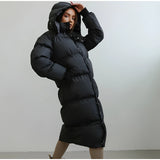 Black windproof women's long winter jacket in size L, featuring a fashionable design. The jacket is lightweight and waterproof, with long sleeves, a defined waist, and extends down to the thighs.