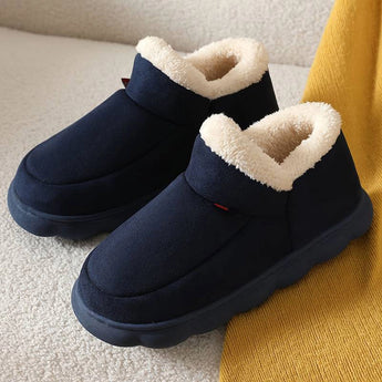 Marine blue winter slip-on shoes in size 41, featuring a fleece-lined, insulated interior with a waterproof exterior. The shoes are designed with composite materials and synthetic rubber, suitable for outdoor use and walking in cold weather.