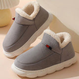 Gray fleece-lined, insulated, and waterproof slip-on winter shoe designed for walking and outdoor activities.