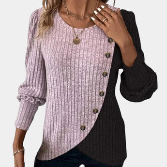 Women's rose-colored asymmetric two-tone sweater in size XL with button detail on the shoulder, featuring long sleeves and a relaxed fit.