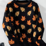 Women's Nero XL Autumn Leaf Pattern Crew Neck Sweater with long sleeves, displayed on a clothes hanger, showcasing a cozy fall fashion style.