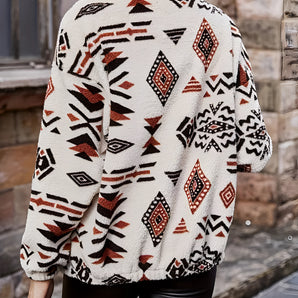 Women's Aztec Tribal Pattern Fleece Jacket in Bohemian Style, featuring a white and black Aztec design. The jacket is modeled by a person showcasing its outerwear fit, with visible shoulders and neck.