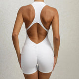Women's backless white seamless compression racerback bodysuit in size XL, showcasing its sleek and form-fitting design on a model.