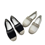 Women's beaded slip-on loafers featuring an elegant design with a silver-toned pattern, made from synthetic rubber material, perfect as stylish summer flats.