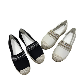 Women's beaded slip-on loafers featuring an elegant design with a silver-toned pattern, made from synthetic rubber material, perfect as stylish summer flats.