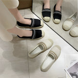 Women's beaded slip-on loafers in black and white, showcasing an elegant design ideal for summer fashion.