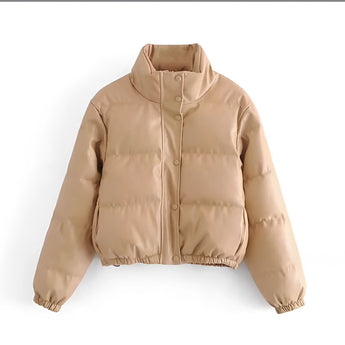Women's beige cropped puffer jacket with insulated winter style, featuring a fur collar and long sleeves, made from natural materials.