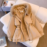 Women's beige fur hooded parka featuring long sleeves and insulated design, showcasing a stylish fashion element with a plush fur collar, ideal for winter wear.