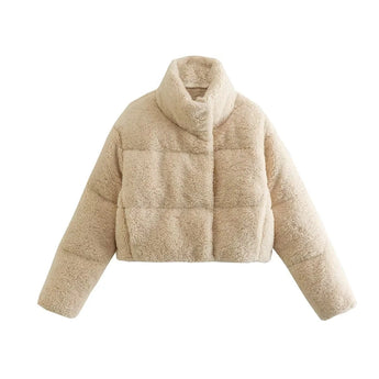 Women's beige high collar fleece winter jacket with long sleeves and a warm woolen texture.