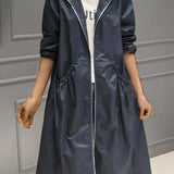 
A women's blue lightweight hooded trench coat in size 4XL, designed as a waterproof spring jacket. The coat features a sleek design with a collar, long sleeves, and a waist tie, showcasing a fashionable and functional one-piece garment.