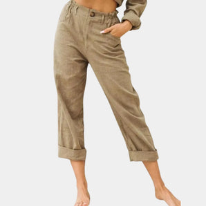 Women's beige linen cuffed pants in brown, size 3XL, shown from waist to knee with an elastic waist and lightweight fabric.