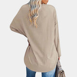 Women's beige long sleeve tunic sweater with a high neck and loose fit design.