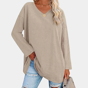 Women's beige long sleeve tunic sweater with a high neck and a loose fit, shown in apricot color and XL size.