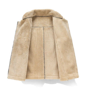 Women's beige luxury shearling jacket featuring a stylish collar, long sleeves, and front pockets, showcased as part of designer winter fashion collection.
