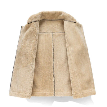 Women's beige luxury shearling jacket featuring a stylish collar, long sleeves, and front pockets, showcased as part of designer winter fashion collection.