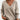 Women's beige oversized V-neck sweater in apricot color, size 2XL, featuring long sleeves and a cozy knit texture, ideal for fall wear.
