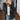 Women's black plush teddy coat in size 5XL, featuring long sleeves, a cozy fuzzy texture, and a stylish design suitable for winter fashion.
