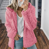 Women's rose-colored plush teddy coat in size 5XL, with a fuzzy texture, long sleeves, and a collar, displayed against a window background.
