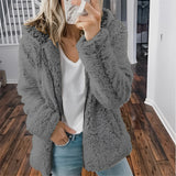 A dark gray plush teddy coat in size 5XL, featuring long sleeves, a high neck, and a cozy, fuzzy texture. The coat is designed for women's winter fashion, providing warmth and comfort.