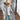Women's light gray plush teddy coat in size 5XL, featuring a warm and fuzzy texture, a collar, long sleeves, and a length that reaches the thighs, ideal for winter fashion outerwear.