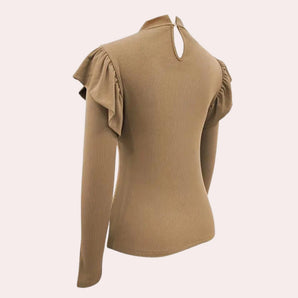 Women's beige ribbed blouse featuring ruffle sleeves and a back keyhole design.