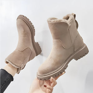 Women's beige suede ankle boots with a fleece lining and slip-resistant soles, displayed in the Cachi color variant, size 43. The boots feature a fashion-forward design, suitable for both style and comfort.