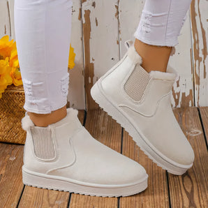 Beige suede slip-on ankle boots for women, showcasing a cozy design suitable for winter, emphasizing footwear fashion and material quality.