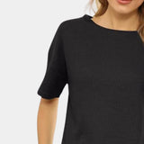 Women's Black Athletic Shorts Set featuring a black t-shirt, showcasing its quick-dry and breathable fabric, ideal for activewear.